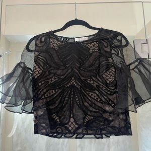 Alexis black lace blouse with nude underlay